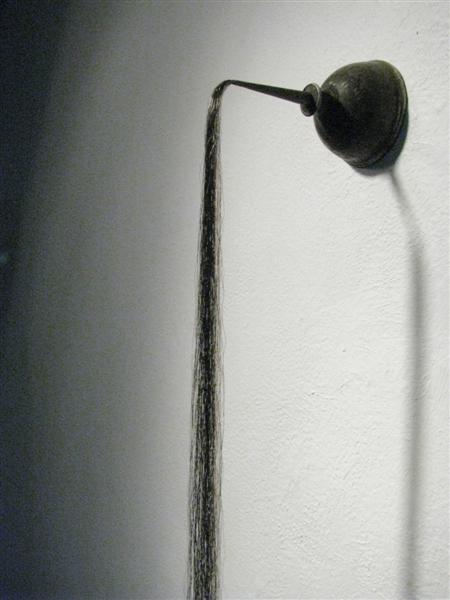 <span>Anoint (detail)</span><br />2014 - 53&quot x 2�&quot x 4&quot - faux hair, oil can, patinas